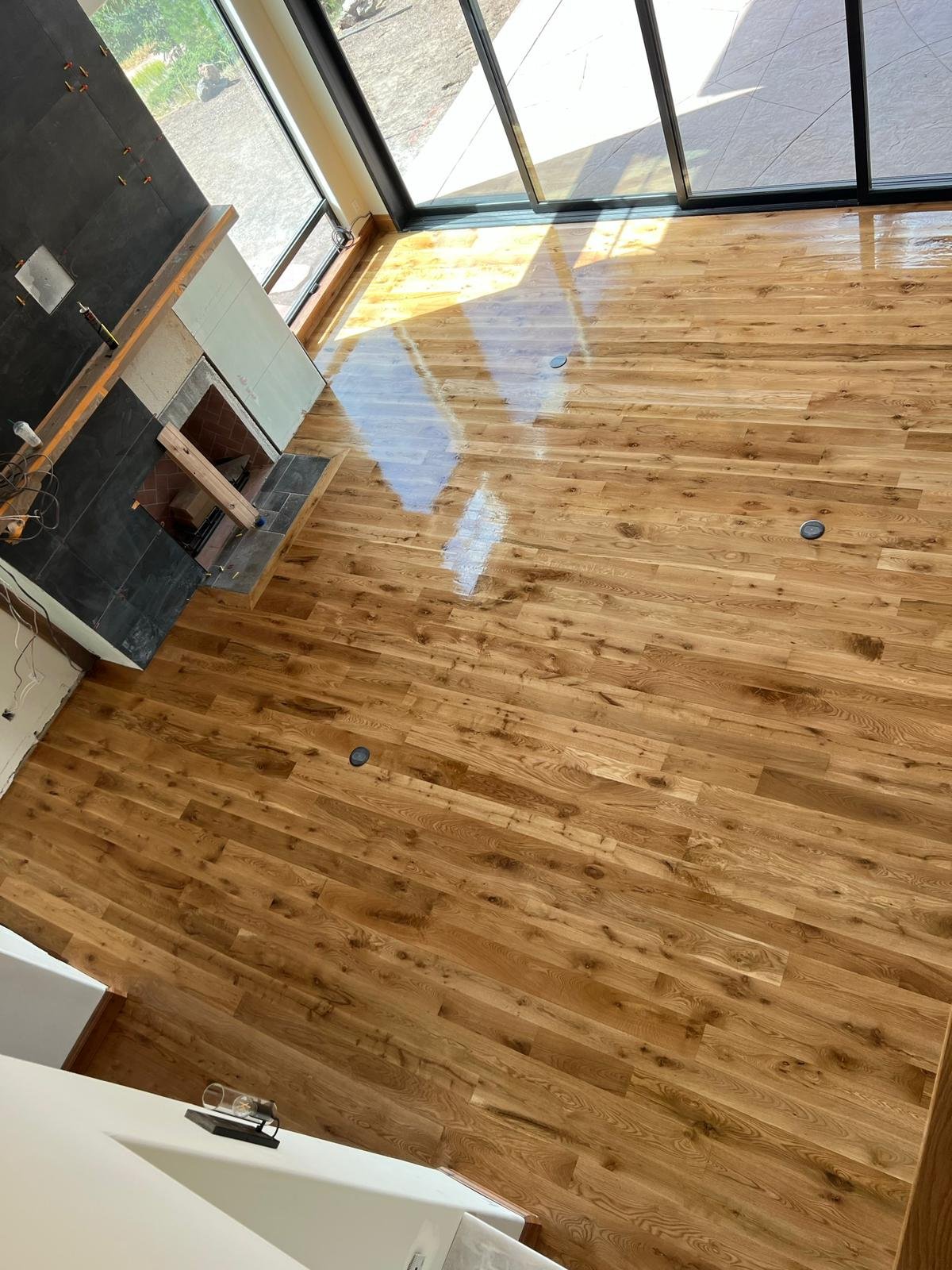 New hardwood flooring installed in a bright residential room