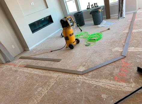 Floor preparation underway in a residential living room